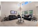 Bright living room with high ceilings and lots of natural light at 14058 Elizabeth St, Thornton, CO 80602
