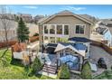 Gorgeous backyard with a private deck, gazebo, hot tub and manicured lawn at 7378 Geode Ct, Castle Rock, CO 80108