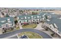 Wonderful aerial view of an apartment complex in a desirable neighborhood with manicured green spaces and parking at 1825 Spaulding Cir, Superior, CO 80027