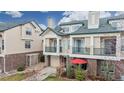 Beautiful townhome with brick accents, outdoor patio and quaint landscaping creates a comfortable living space at 1825 Spaulding Cir, Superior, CO 80027