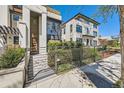 Charming two-story residence showcasing a modern architectural style and landscaping at 427 Milwaukee St, Denver, CO 80206