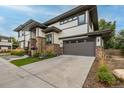 Beautiful two-story home featuring professionally landscaped front yard and attached two-car garage at 5420 Baseline Rd, Boulder, CO 80303