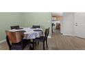 Dining room with wood floors and natural light at 23 Shetland Ct, Highlands Ranch, CO 80130