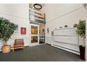 Well-lit lobby featuring a seating area, mailboxes, and a secure entrance for a welcoming first impression at 720 S Clinton St # 1B, Denver, CO 80247