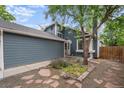 A beautiful two-story home featuring a well-manicured front yard and inviting entrance at 13341 Birch Cir, Thornton, CO 80241