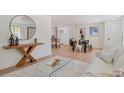 Bright living room with hardwood floors, large windows and modern furniture at 34 University Dr, Longmont, CO 80503