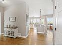 The entryway boasts gorgeous hardwood floors leading to a bright, open living space at 444 Pasada Way, Monument, CO 80132