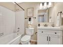 Clean bathroom with a tub, sink, and vanity at 16038 E Oxford Dr, Aurora, CO 80013