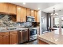 Updated kitchen, granite countertops, stainless steel appliances at 1630 N Clarkson St # 320, Denver, CO 80218