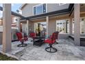 Outdoor patio with seating area, a built-in grill, and pergola at 4942 S Zephyr St, Littleton, CO 80123