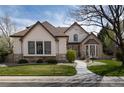 Lovely home with well-maintained landscaping, stone accents, and inviting walkway at 6271 S Billings Way, Centennial, CO 80111