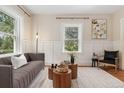 Inviting living room with neutral tones, comfortable seating, and a decorative rug at 187 S Pearl St, Denver, CO 80209
