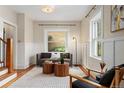Bright living room showcasing modern furniture and decor, complemented by natural light at 187 S Pearl St, Denver, CO 80209