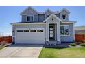 Charming two-story home with a well-manicured lawn and inviting front entrance at 542 W 173Rd Ave, Broomfield, CO 80023