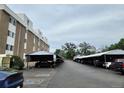 Row of covered parking spots available to residents of the apartment building at 384 S Ironton St # 407, Aurora, CO 80012