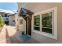 Inviting front entrance features a covered doorway with large windows and a well-maintained walkway at 2800 Aurora Ave # 121, Boulder, CO 80303