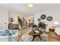 Bright and airy living room with hardwood floors, modern furnishings, and stylish decor at 284 S Lincoln Ave, Louisville, CO 80027