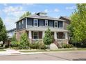 Beautiful two-story home with a brick and siding exterior, complemented by a well-manicured front yard at 10109 E 28Th Ave, Denver, CO 80238
