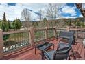 Outdoor deck featuring beautiful mountain views and patio furniture for relaxing and enjoying the scenery at 34 Highfield Trl # 311, Breckenridge, CO 80424