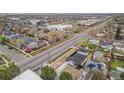 Wide aerial perspective showing the home's location and neighborhood at 1990 Ulster St, Denver, CO 80220