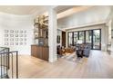 Bright and airy living room featuring a fireplace, large windows, and modern decor at 40 Royal Ann Dr, Greenwood Village, CO 80111