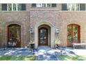 Elegant entryway with double doors and brick facade at 559 N Williams St, Denver, CO 80218