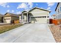 Inviting single-Gathering home with a spacious driveway and a two-car garage in a suburban neighborhood at 9533 Cherry Ln, Thornton, CO 80229