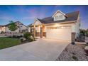 Lovely single-Gathering home with a stone-accented facade and attached two-car garage at 19688 E 52Nd Ave, Denver, CO 80249