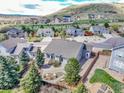 This home features professional landscaping, a privacy fence, and close proximity to the surrounding community at 1034 Halfmoon Dr, Castle Rock, CO 80104