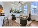 This living room offers stylish seating and bright airy windows, creating a peaceful and inviting space at 108 W Byers Pl # 106, Denver, CO 80223