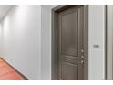 Condo entrance featuring a contemporary door with unit number and modern hardware at 14301 E Tennessee Ave # 109, Aurora, CO 80012