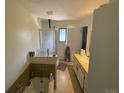 Clean bathroom with a shower, tub, and a window for ventilation and natural light at 8995 E Cornell Ave, Denver, CO 80231