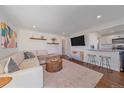 Bright living room with hardwood floors, modern decor, and an open floor plan at 3753 N Cook St, Denver, CO 80205