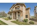 Charming home with a cozy front porch and stylish pergola at 5624 Killdeer St, Brighton, CO 80601