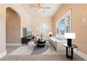 Bright living room featuring a comfy sofa and large TV at 4739 Pearl St, Denver, CO 80216