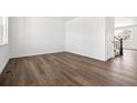 Bright living room with hardwood floors and white walls, offering a clean and spacious feel with natural light at 39141 Anthony St, Elizabeth, CO 80107