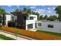 Modern two-story home with a combination of white, brown, and dark gray elements and a wood fence at 1601 S Columbine St, Denver, CO 80210