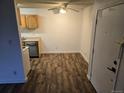 Efficient kitchen area with modern appliances, light wood cabinets and a dining area at 10211 Ura Ln # 9-308, Thornton, CO 80260