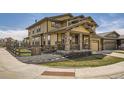 Beautiful home exterior with manicured landscaping and a charming fence at 10178 Nadine Ave, Parker, CO 80134