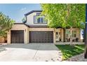 Charming two-story home featuring a brick facade and a spacious three-car garage at 7852 Solstice Way, Castle Rock, CO 80108