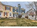 Attractive townhomes with varied facades and manicured lawns offer a welcoming curb appeal at 9467 W Ontario Dr, Littleton, CO 80128