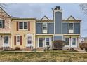 Charming townhomes featuring unique architectural details and inviting entrances at 9467 W Ontario Dr, Littleton, CO 80128