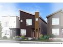 Modern home exterior with dark siding, clean lines, and professional landscaping at 1606 W 166Th Ave, Broomfield, CO 80023