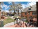 View from the cozy front porch overlooking the beautifully landscaped courtyard at 1419 Dexter St, Denver, CO 80220