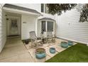 Inviting front porch with seating and manicured landscaping at 4505 S Yosemite St # 433, Denver, CO 80237
