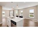 Modern kitchen with white countertops, stainless steel appliances, and sleek cabinetry at 2374 S University Blvd # 202, Denver, CO 80210