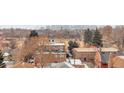 View of the city skyline with nearby neighborhood featuring brick homes at 2990 E 17Th Ave # 1102, Denver, CO 80206