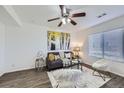 Bright living room featuring modern furniture, stylish decor, and hardwood floors, creating a welcoming atmosphere at 5873 Ceylon St # E, Denver, CO 80249