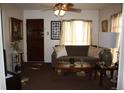 Inviting living room with comfortable seating, soft lighting, and a cozy atmosphere at 5095 Grant St, Denver, CO 80216