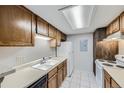 Functional kitchen with white appliances and ample counter space at 18193 E Kentucky Ave # 204, Aurora, CO 80017